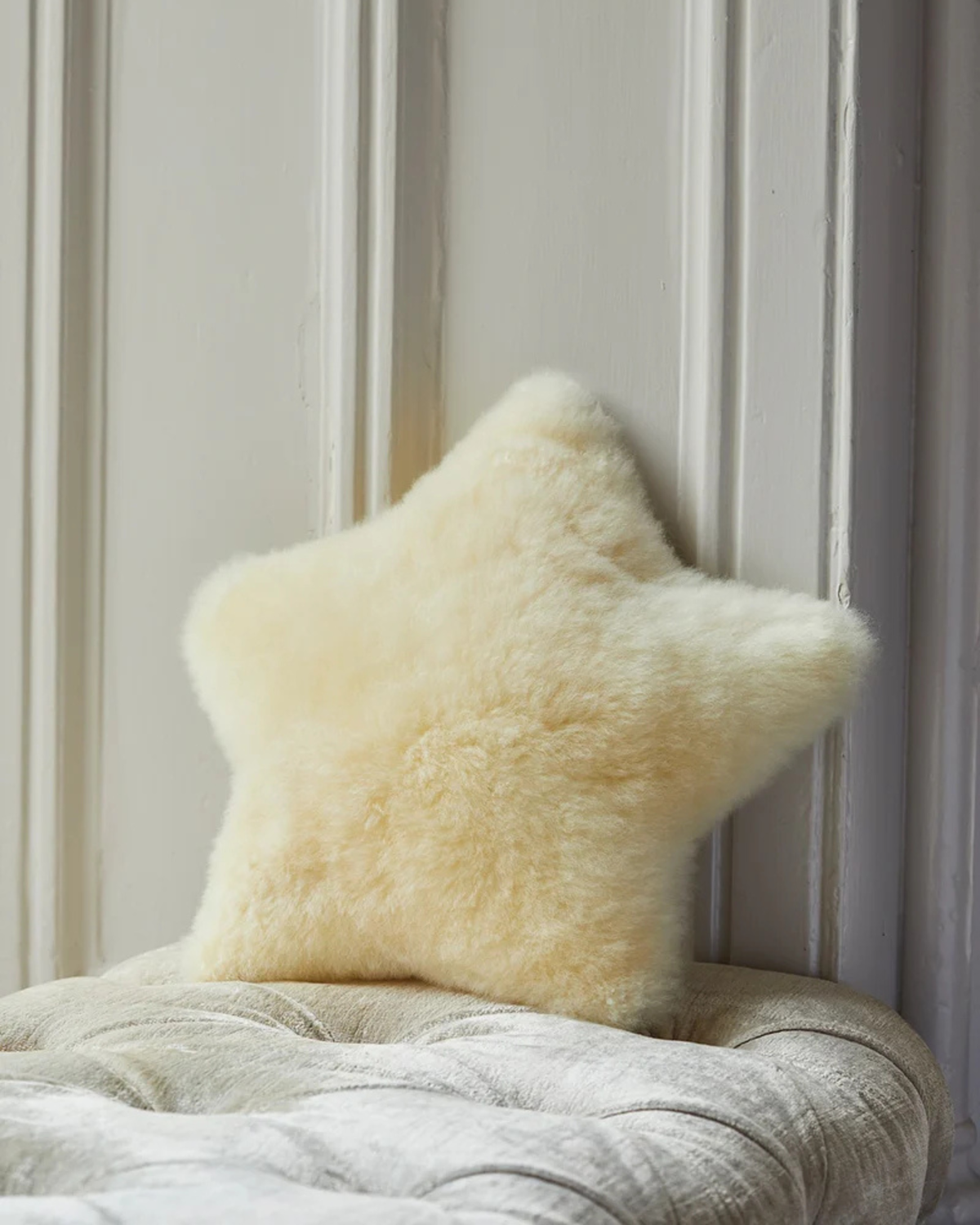 Lacorine champagne alpaca fur star cushion for home decor, soft plush texture, decorative accent for living spaces.