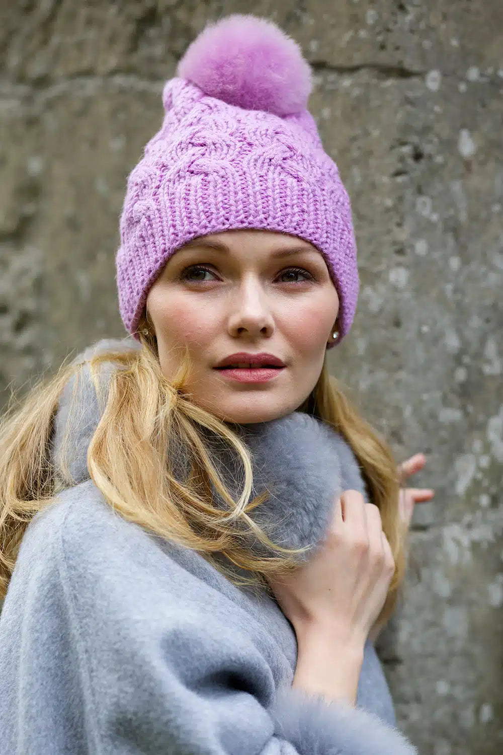 Lilac Lacorine pom pom alpaca beanie hat with a matching alpaca headband, featuring soft, cozy wool and stylish pom pom detail.