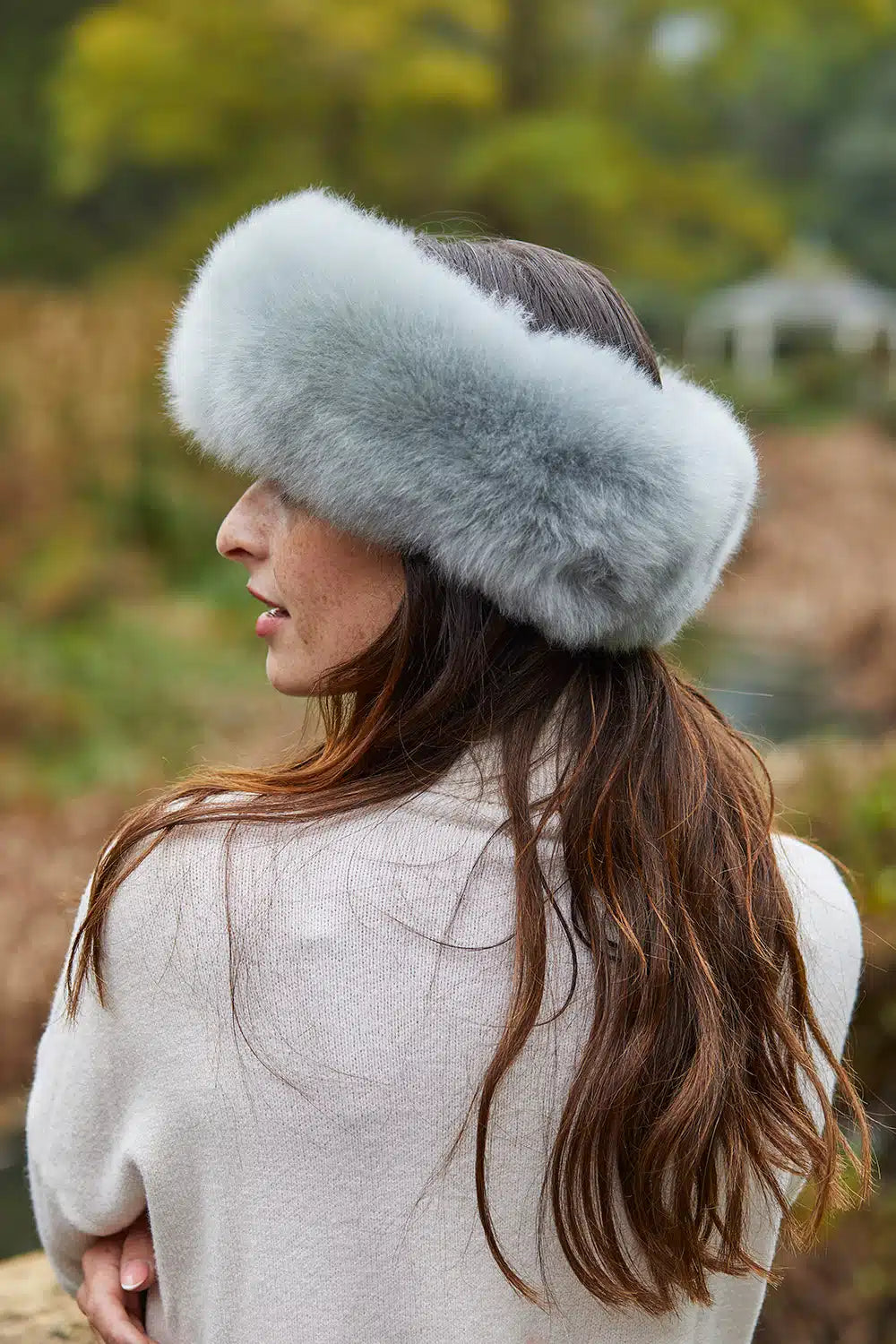 Ice blue luxury alpaca fur headband from Lacorine, cozy and stylish alpaca hat and headband for cold weather.