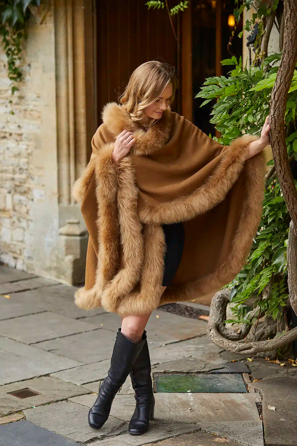 Lacorine Annabelle fur-trimmed alpaca cape in caramel color, featuring plush fur accents and cozy, elegant design.