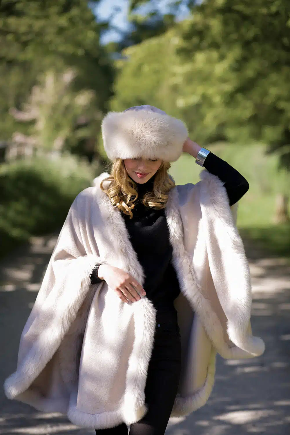 Lacorine Annabelle fur-trimmed alpaca cape in oyster color, stylish and warm outerwear with plush fur accents.