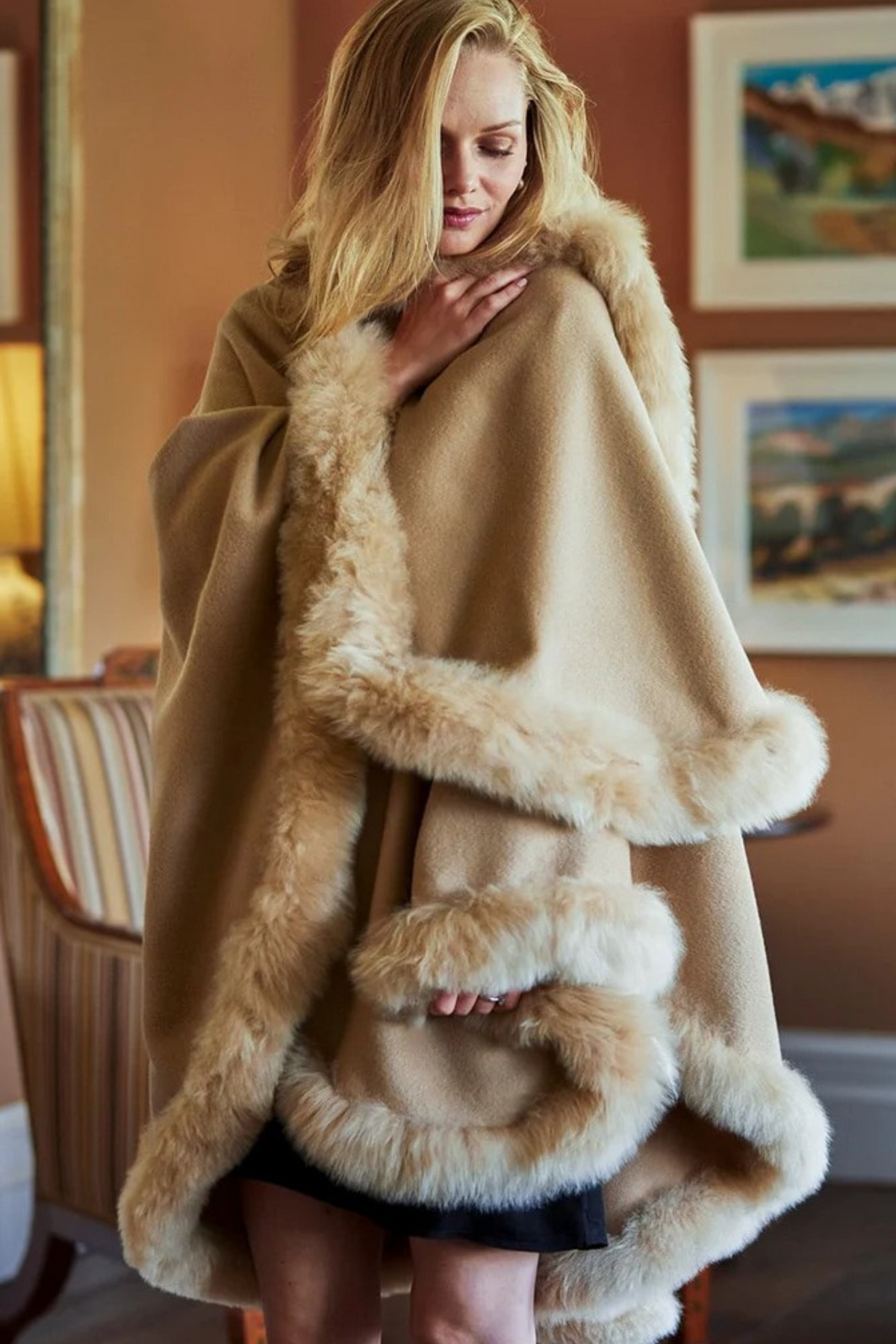 Lacorine Annabelle fur-trimmed alpaca cape in golden beige, featuring soft alpaca fabric and luxurious fur trim.