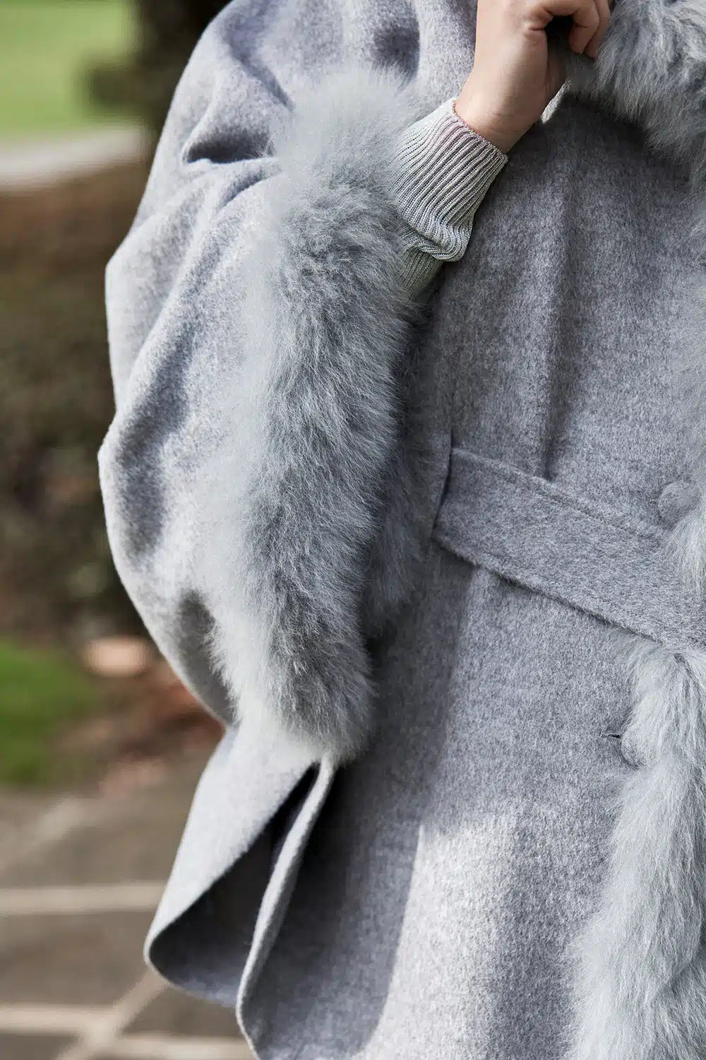 Lacorine Lucia fur-trimmed alpaca coat in silver grey, featuring a cozy, elegant design with plush fur trim on the collar and hem.