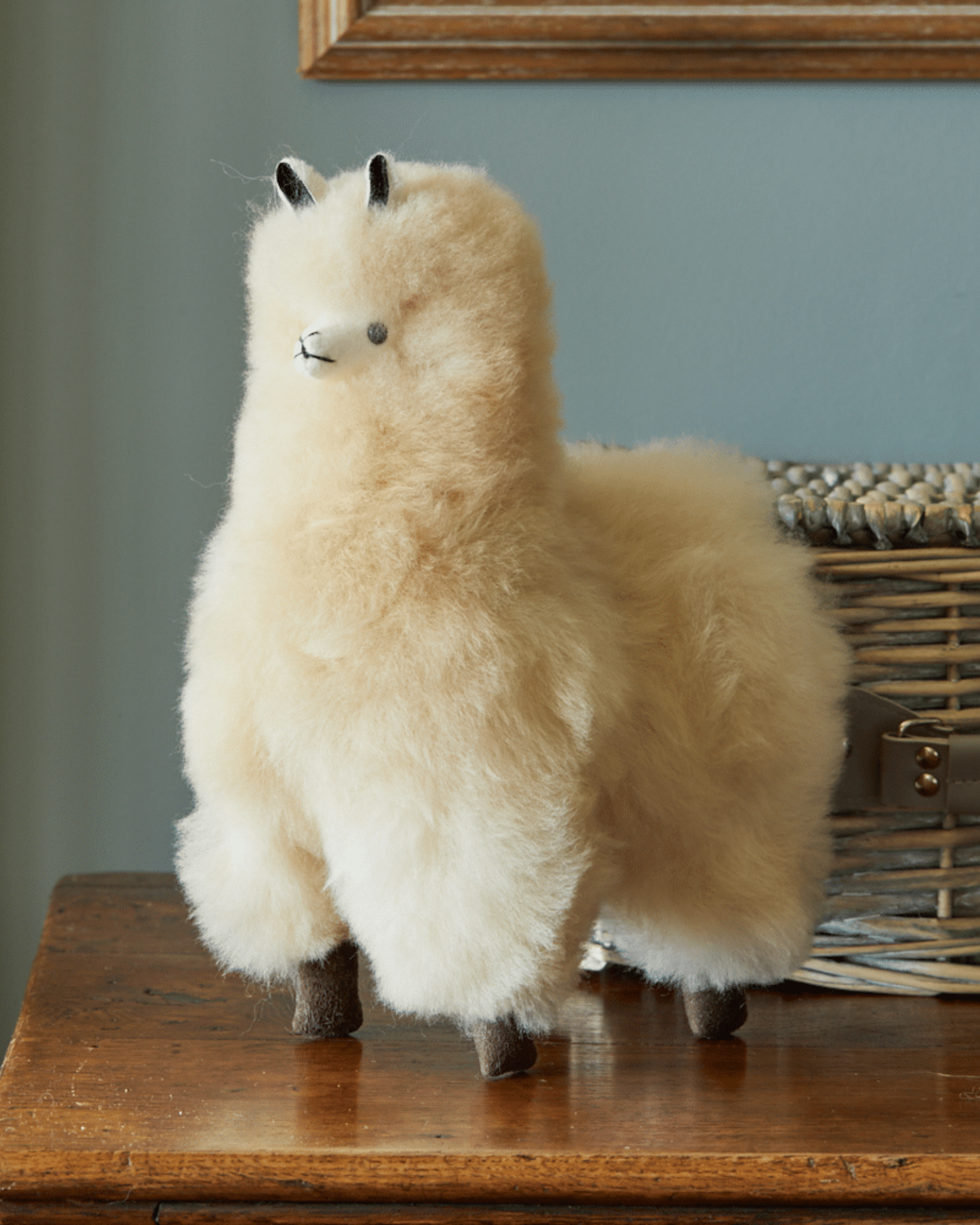 Cream-colored Alpaca collectible by Lacorine, featuring soft baby alpaca fur and a charming, detailed design in champagne tone.