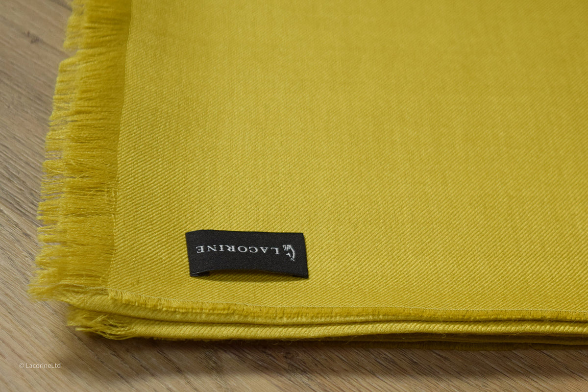 Yellow Lacorine Royal Alpaca Pashmina knitwear with soft, luxurious fabric and intricate knit pattern.