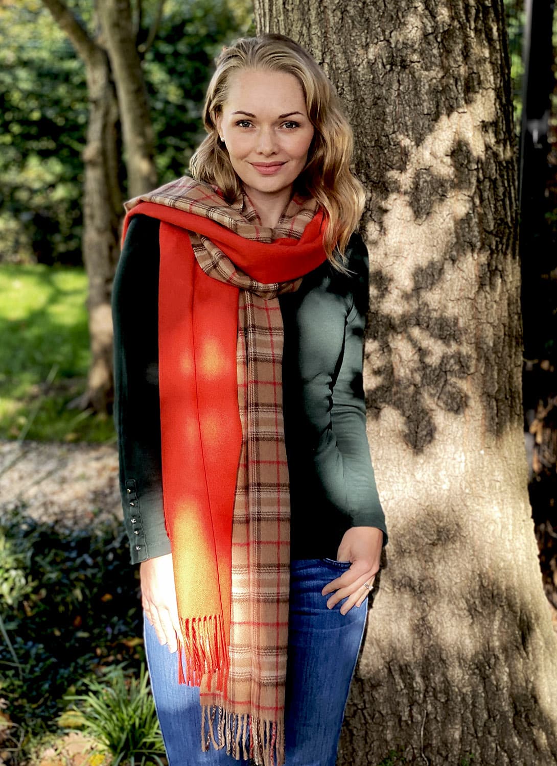 Orange checkered alpaca knit scarf by Lacorine, featuring a cozy, soft texture and stylish pattern.