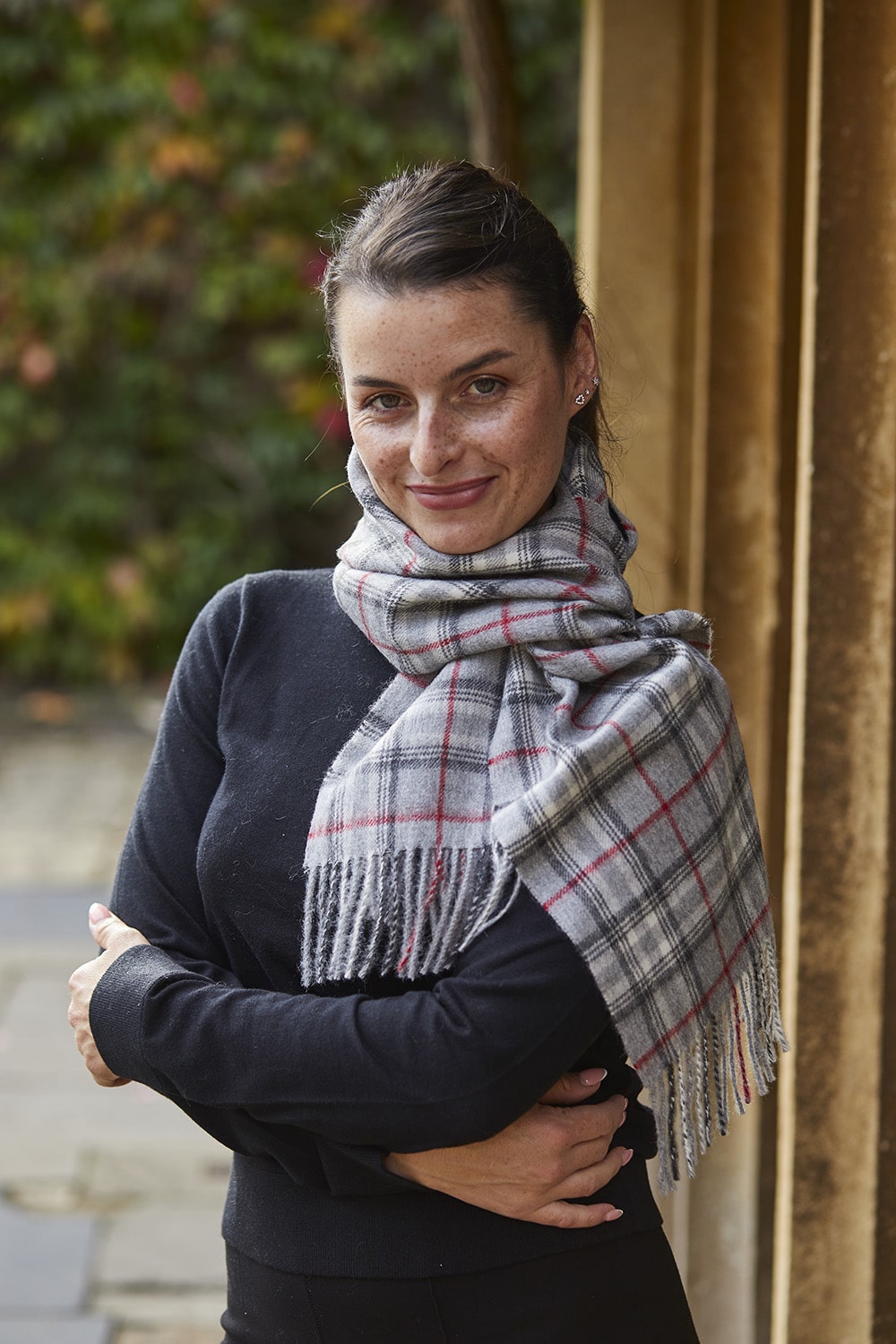 Grey check alpaca wool scarf from Lacorine, soft and cozy with a classic pattern, ideal for cold weather wear.
