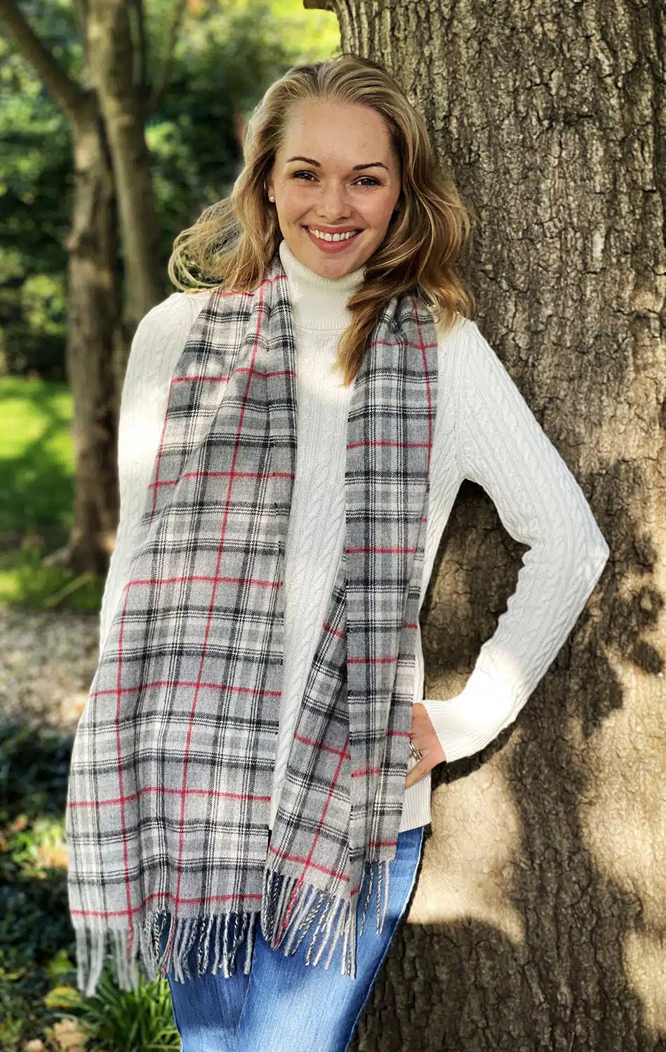 Grey check alpaca wool scarf by Lacorine, soft and cozy with a classic pattern, perfect for cold weather.