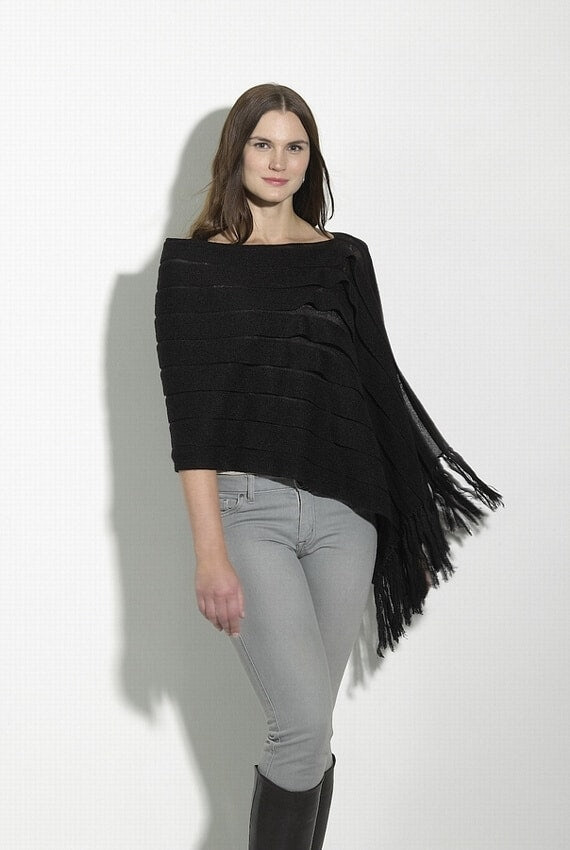 Lacorine Emperatriz luxury wool shawl in soft, warm black alpaca wool, draped to showcase its elegant and cozy design.