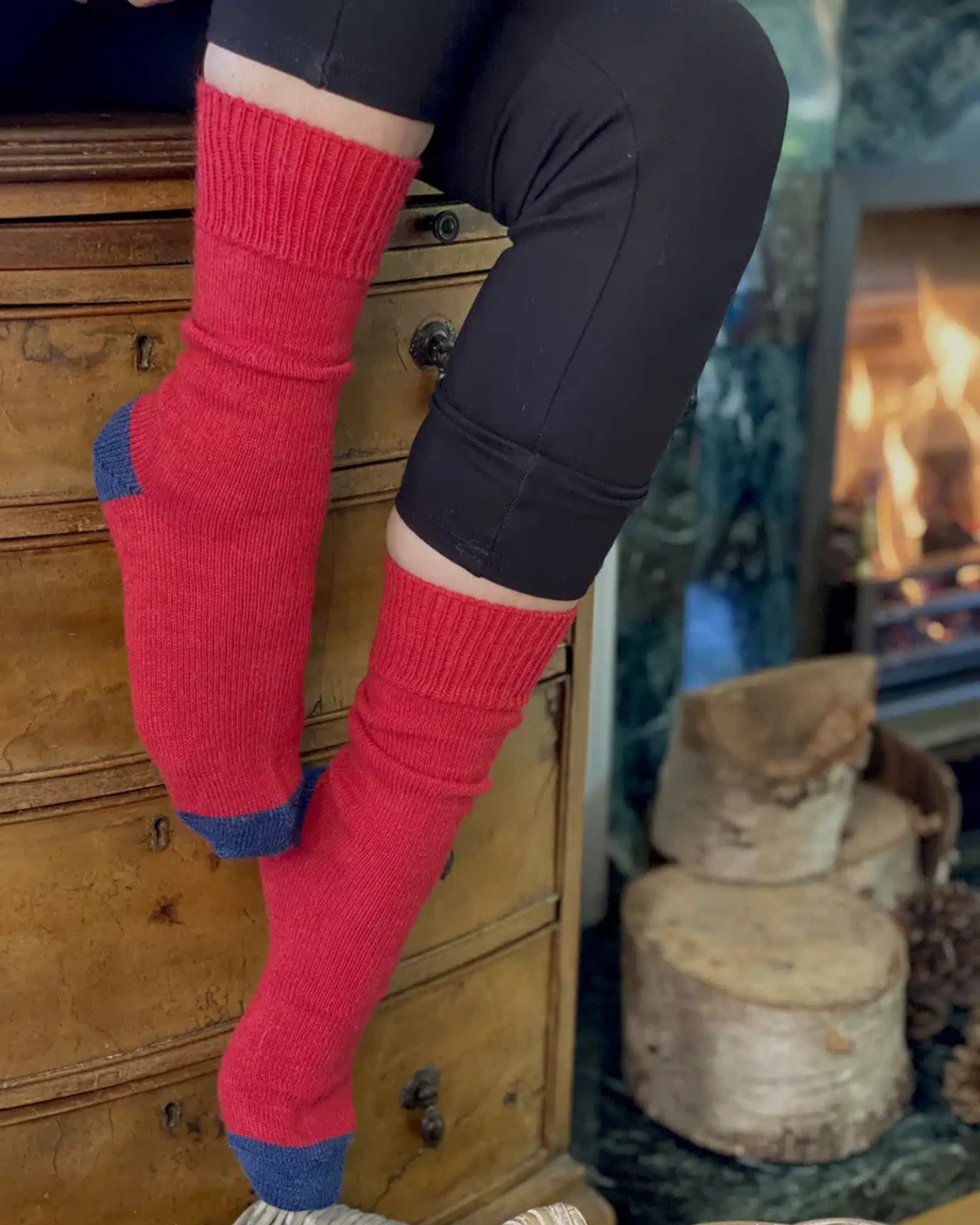 Red and navy Lacorine women's everyday luxury wool socks shown in a close-up view.