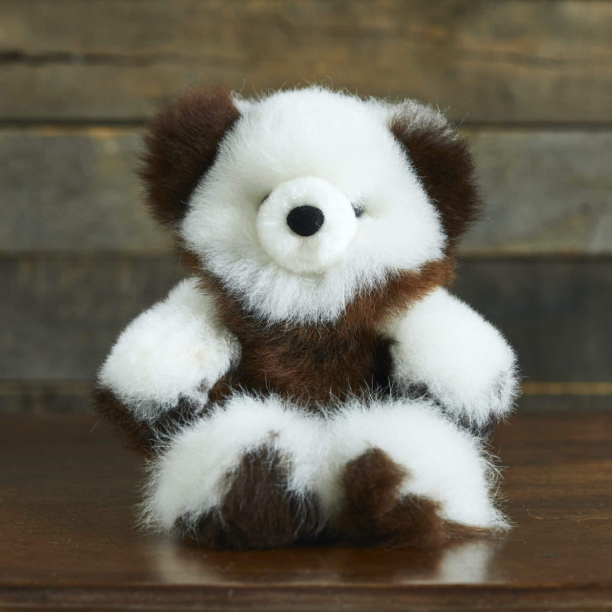 Variegated alpaca fur teddy bear by Lacorine, classic plush stuffed toy with soft, textured fur and adorable design.