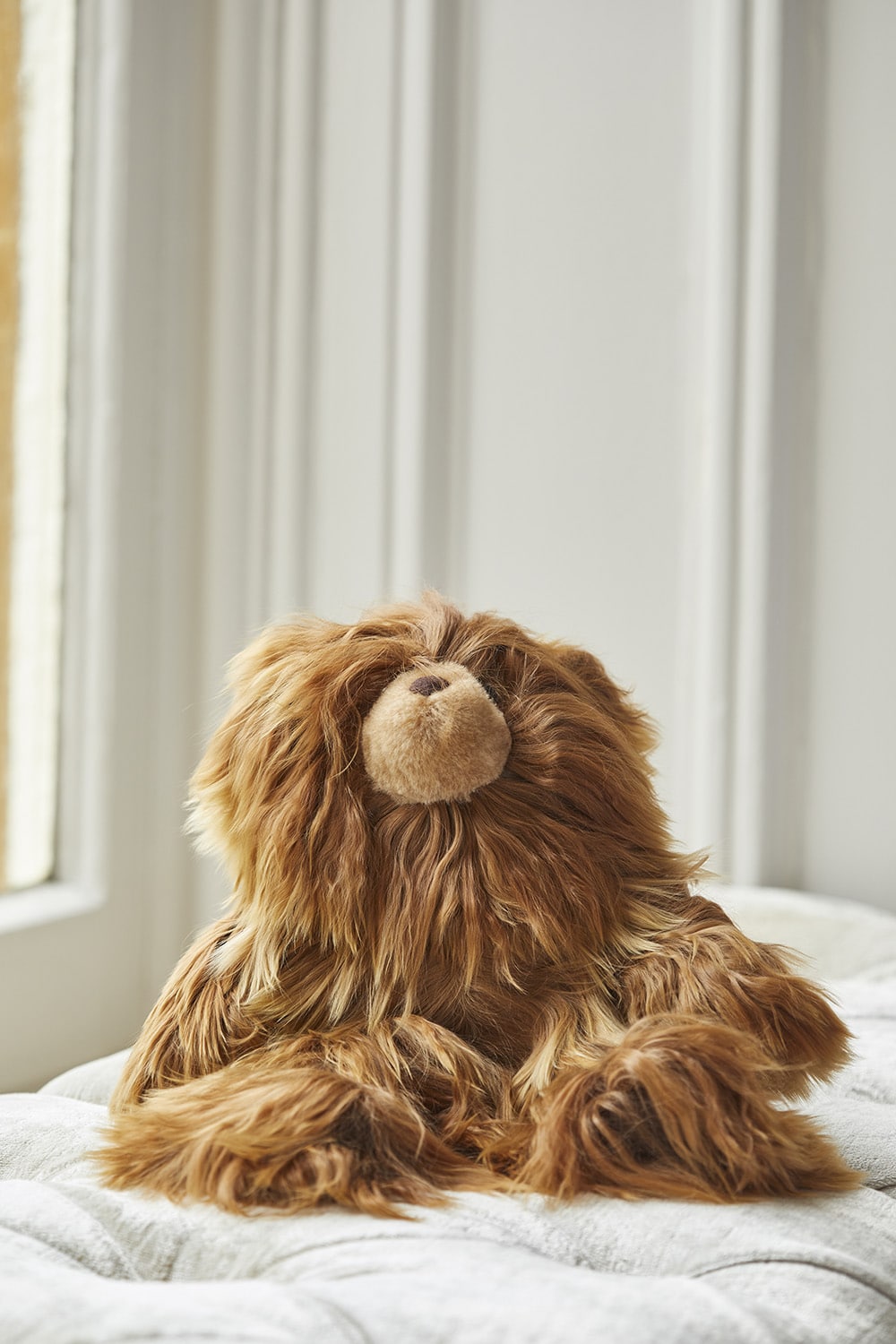 Limited edition Rocco Teddy Bear in dark camel by Lacorine, featuring soft plush fabric and a charming teddy bear design.