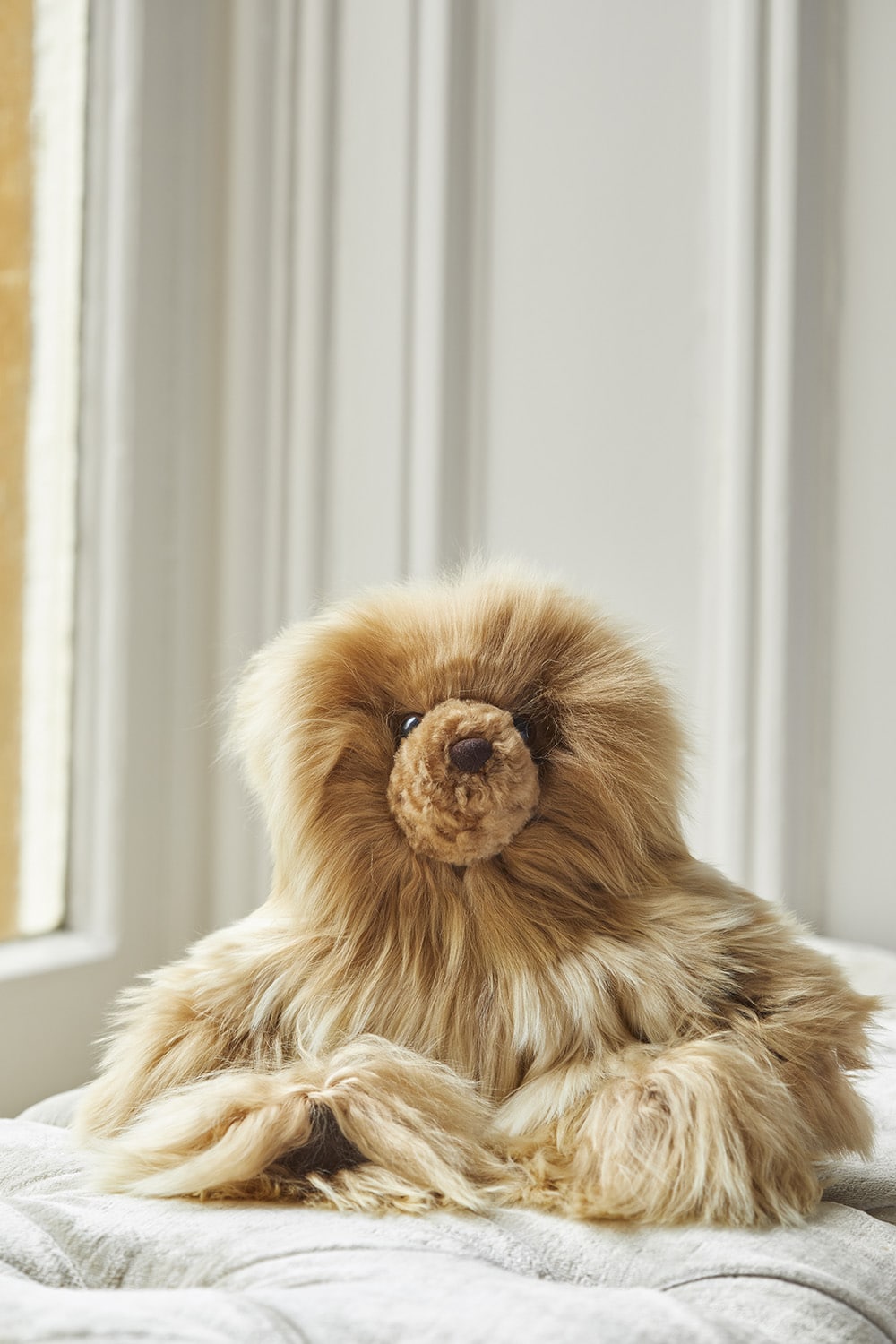 Lacorine limited edition Rocco teddy bear in light camel plush with soft, cuddly fur and embroidered facial features.