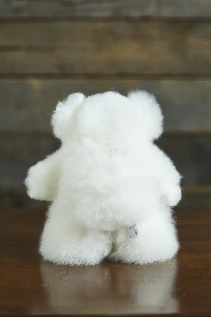 White Mini Louis alpaca fur teddy bear by Lacorine, soft plush toy with adorable features and cozy fur texture.