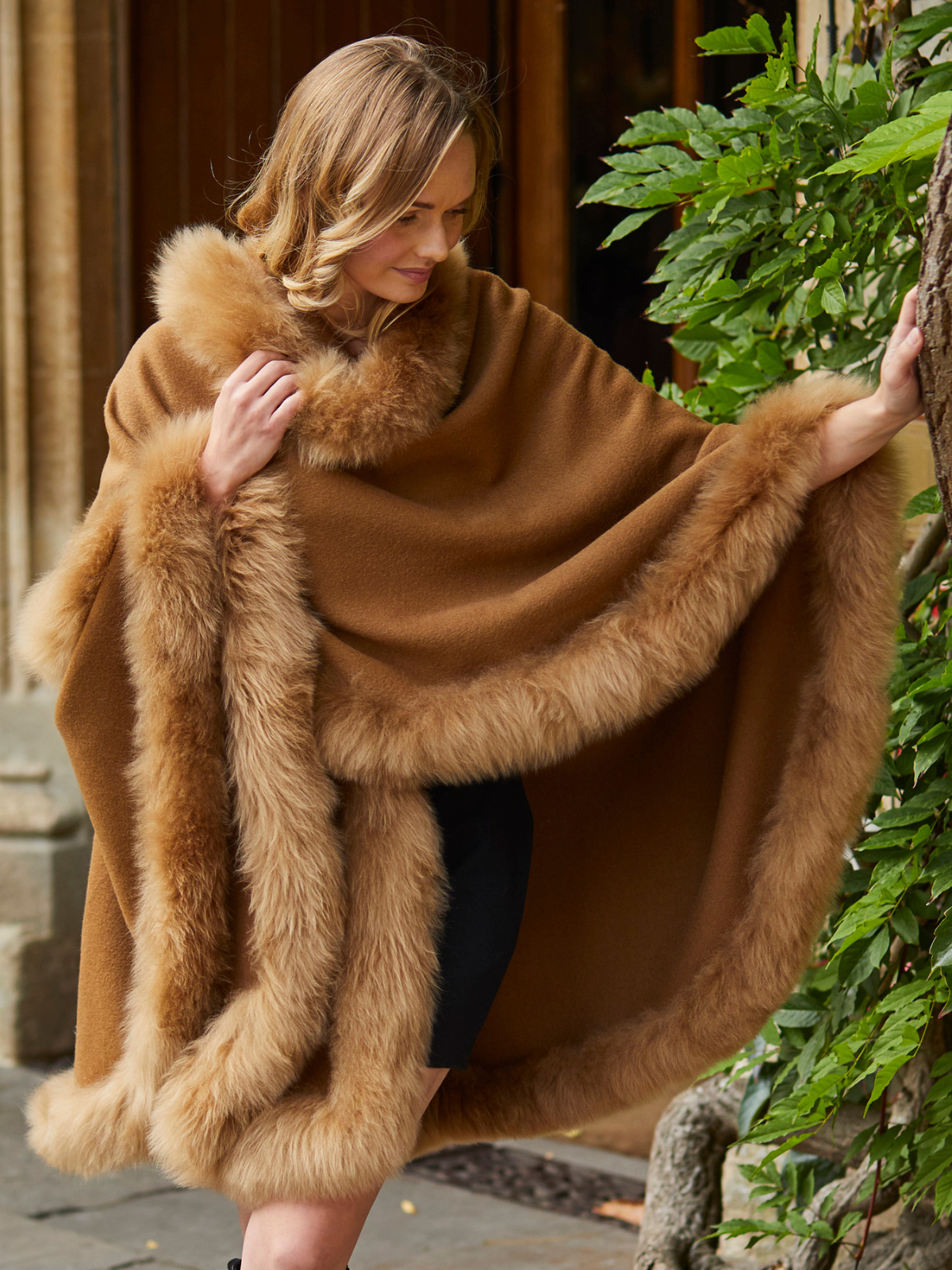 Luxury alpaca fur trimmed cape - sustainable luxury