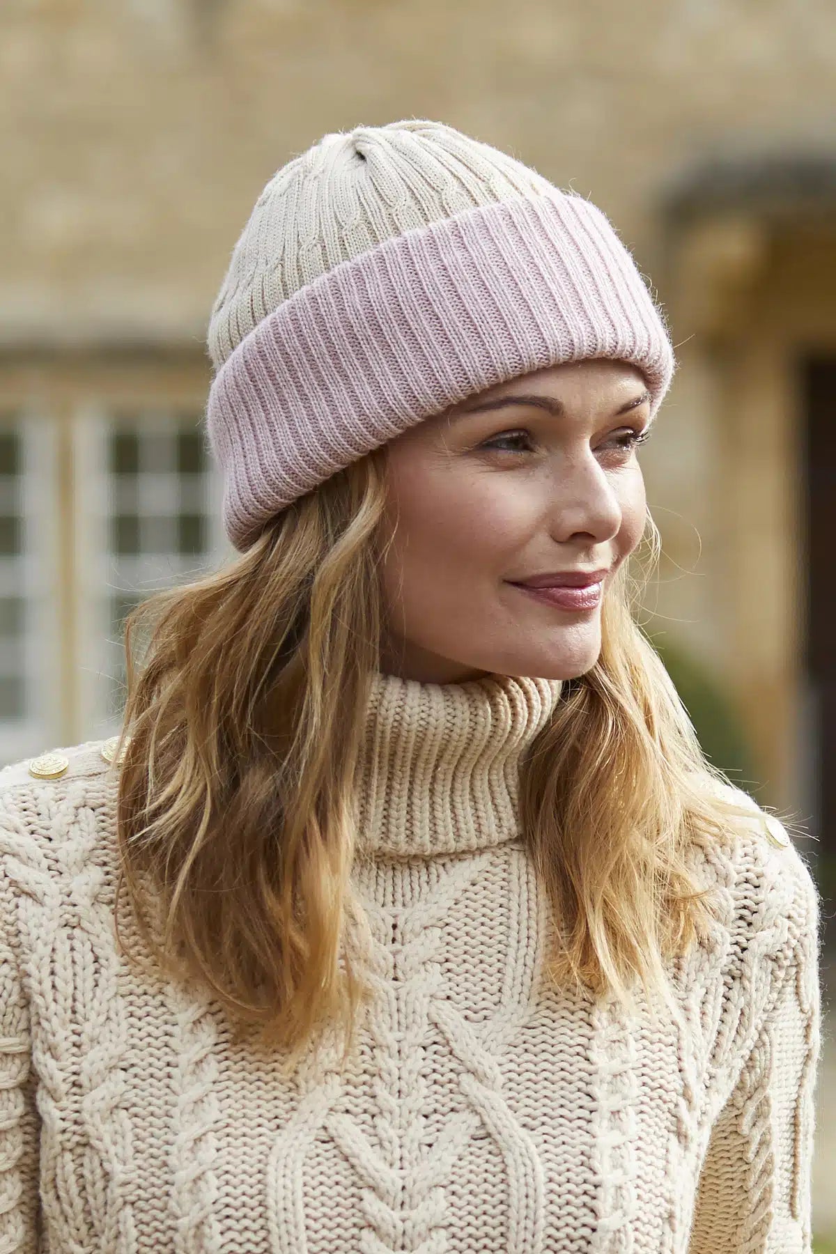 Reversible alpaca wool beanie hat in oat and pink colors, featuring a cozy, soft knit design by Lacorine.