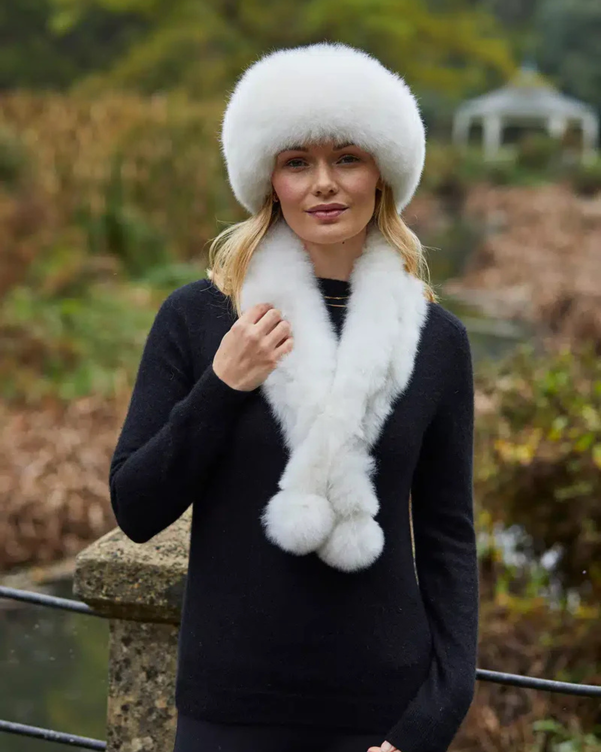 White luxury alpaca fur headband from Lacorine, soft and plush alpaca hat and headband for warmth and style.