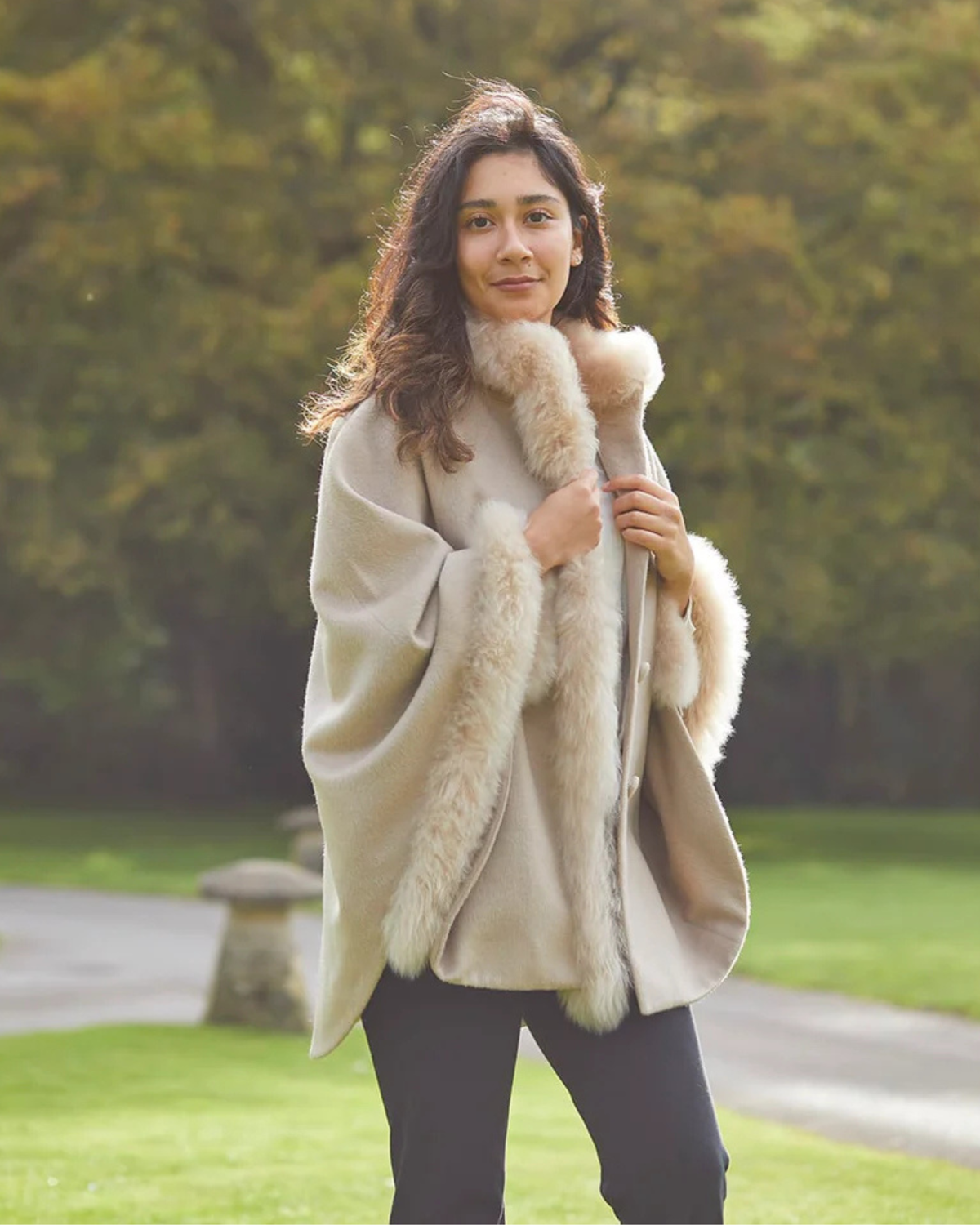 Luxurious Lacorine alpaca coat with elegant fur trim, showcasing a stylish and warm outerwear piece.