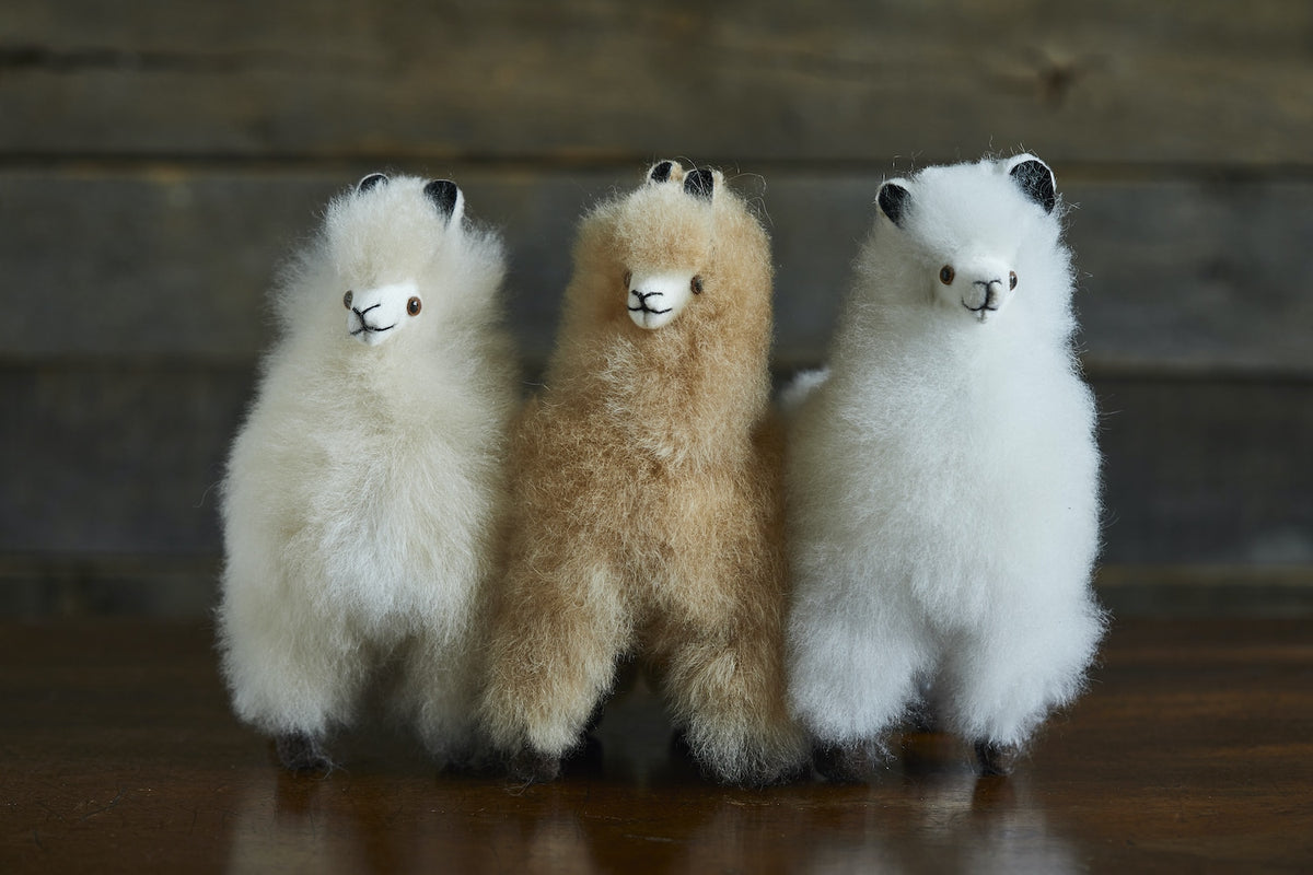 Lacorine mini alpaca fur collectable in fudge variegated color, soft plush texture, small decorative item.