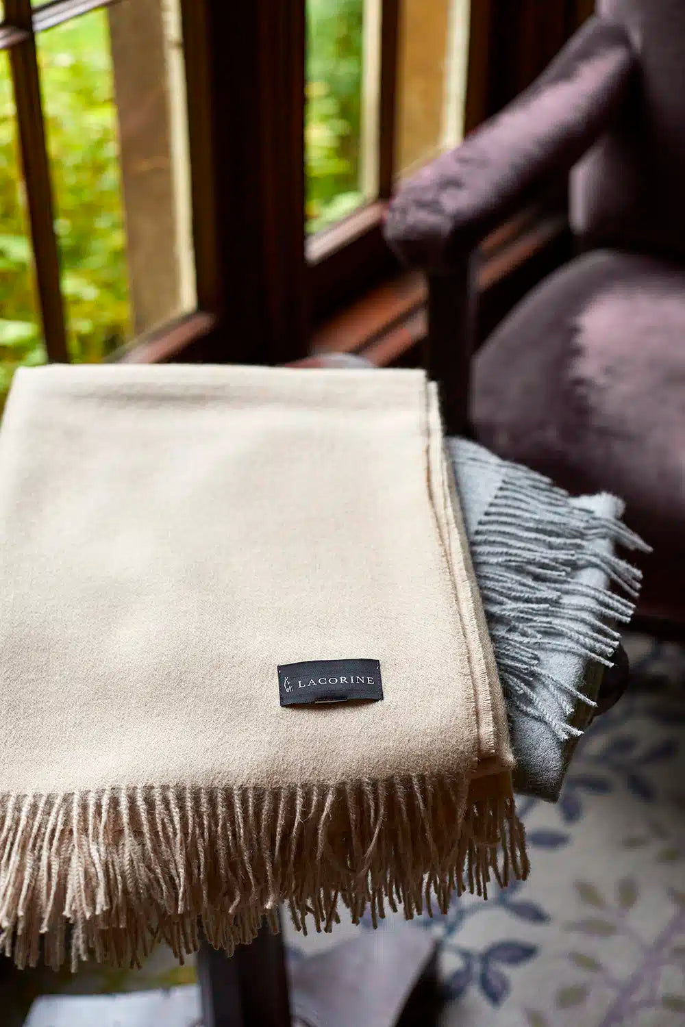 Luxurious alpaca throw by Lacorine, made from soft Peruvian alpaca wool, perfect for cozy home decor and warmth.