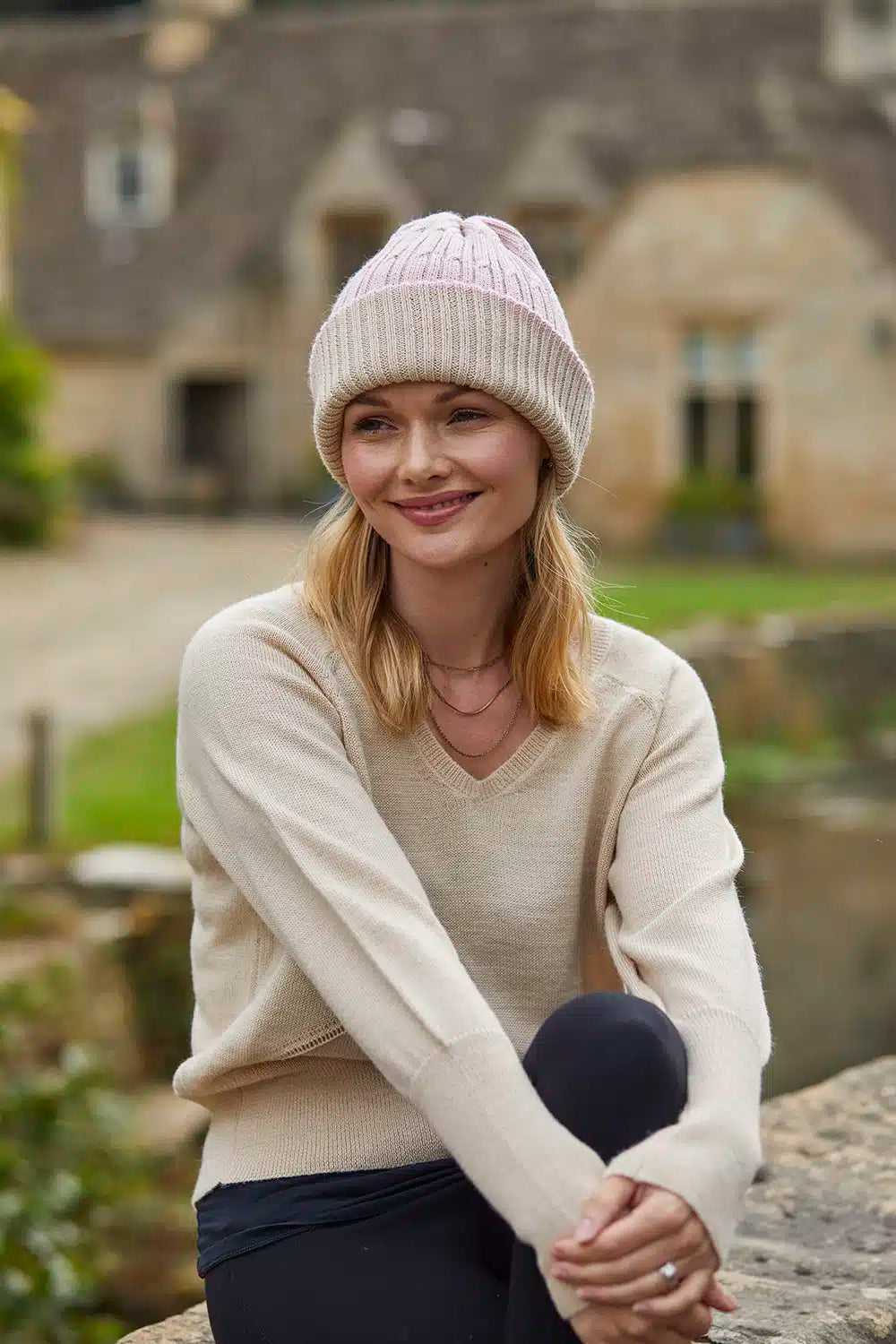 Cream Alpaca Jumper by Lacorine featuring a V-neck and cozy knit texture, perfect for a stylish and warm winter look.