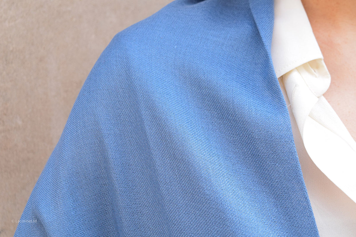 Close-up of light blue Lacorine Signature Pashmina knitwear featuring soft alpaca fibers and fine craftsmanship.