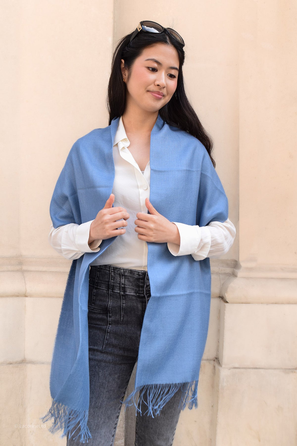 Light blue Lacorine Signature Pashmina knitwear with soft, luxurious fabric and elegant knit pattern visible in the image.