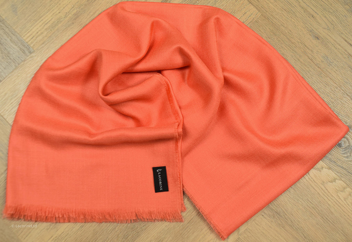 Coral Lacorine Royal Alpaca Pashmina knitwear displayed flat, showcasing soft, luxurious alpaca fabric and intricate knitting details.