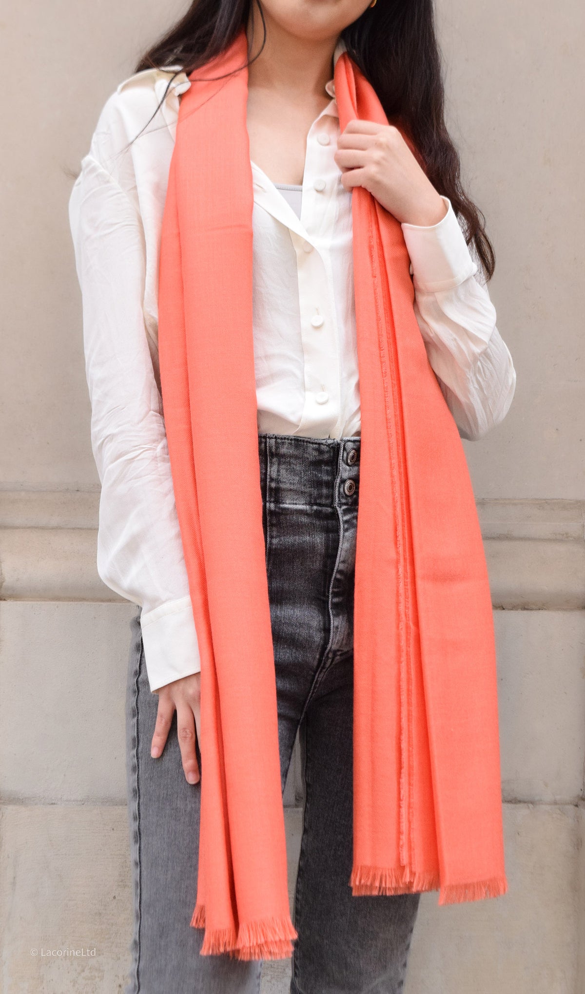 Coral Royal Alpaca Pashmina knitwear by Lacorine, showcasing soft, luxurious fabric with a cozy, elegant knit pattern.