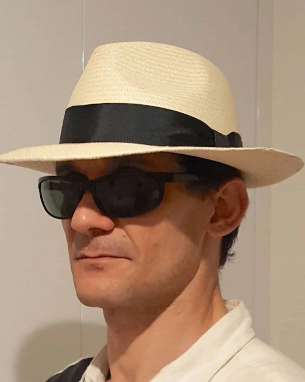 Men's Lacorine Panama hat with a classic trilby style, made from sustainable alpaca wool, featuring a wide brim and stylish design.