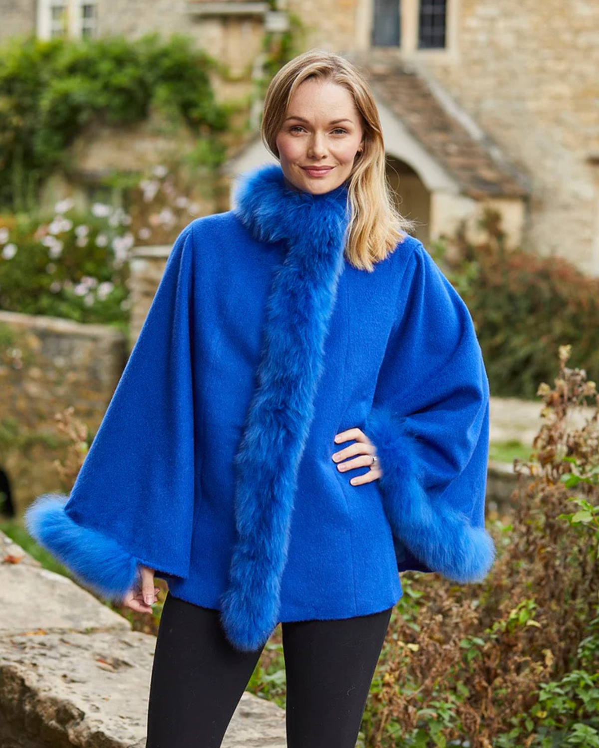 Lacorine Felicity fur-trimmed alpaca poncho showcasing cozy alpaca fabric and plush fur trim, perfect for stylish warmth.