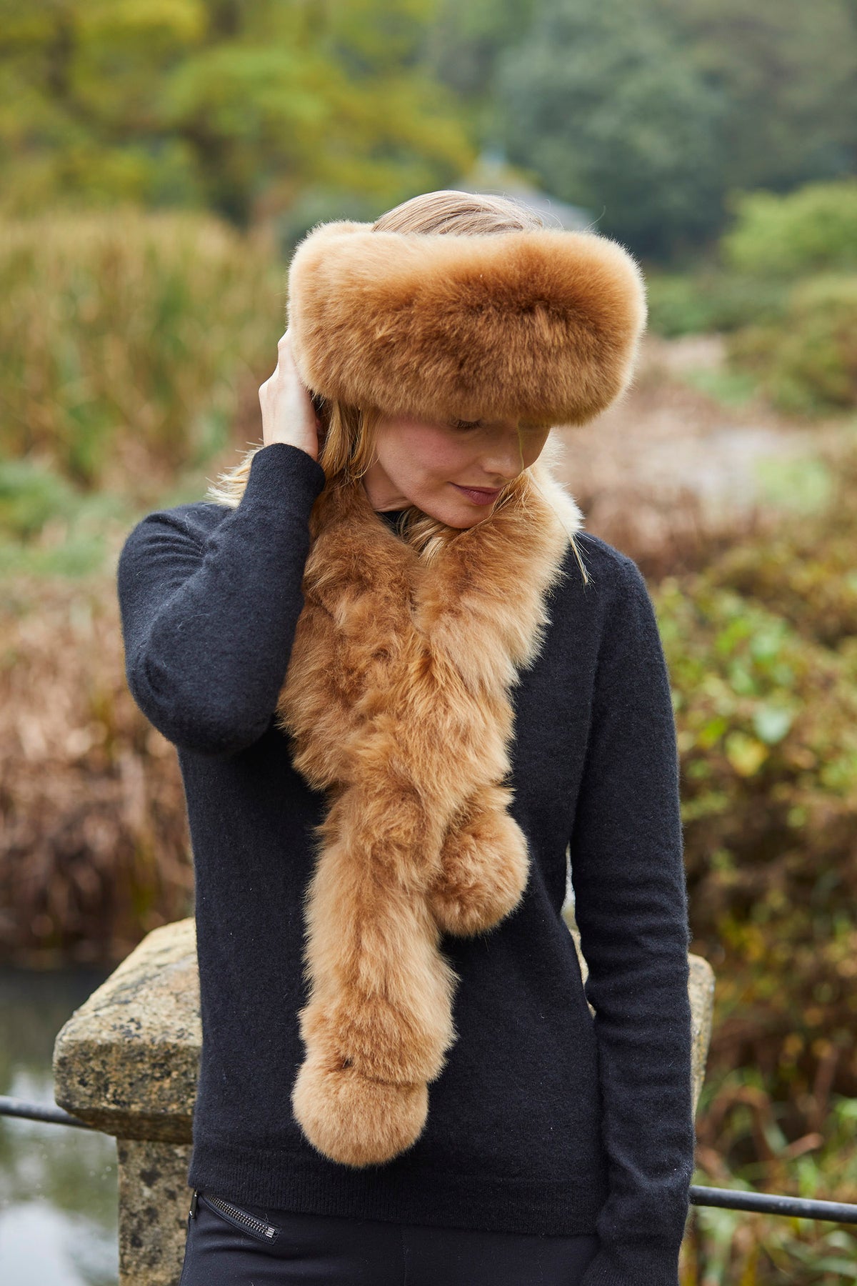 Luxury caramel Alpaca fur scarf by Lacorine, showcasing soft, plush texture and elegant drape in a close-up view.