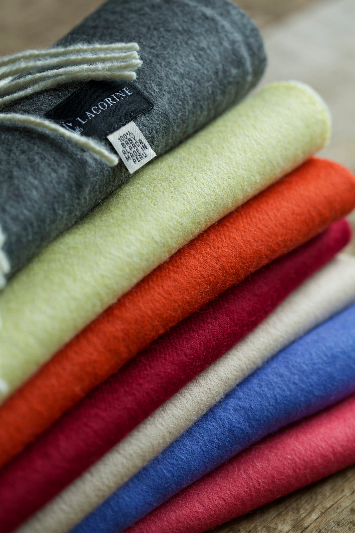 Luxurious Lacorine fine alpaca knit scarf showcasing soft, sustainable alpaca fibers in a cozy, stylish accessory.