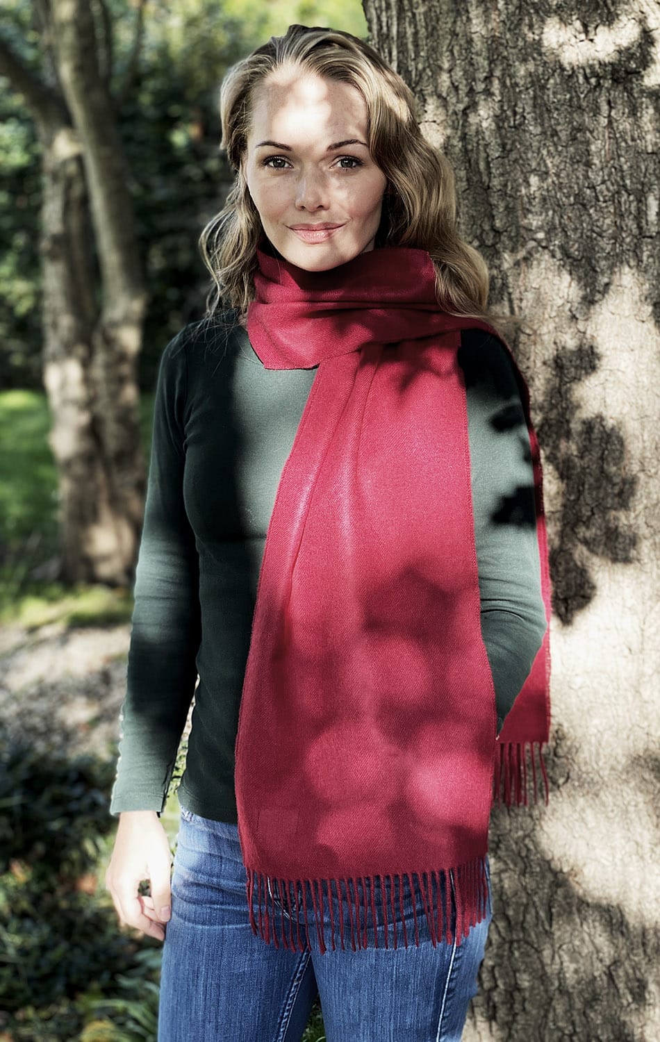 Dark red Lacorine fine alpaca knit scarf draped, showcasing soft, cozy texture and elegant warmth perfect for winter wear.