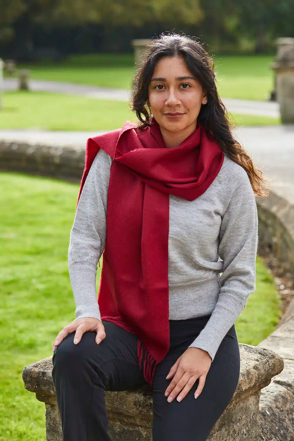 Lacorine fine alpaca knit scarf in soft, neutral tones, showcasing its lightweight, cozy texture perfect for cold weather.