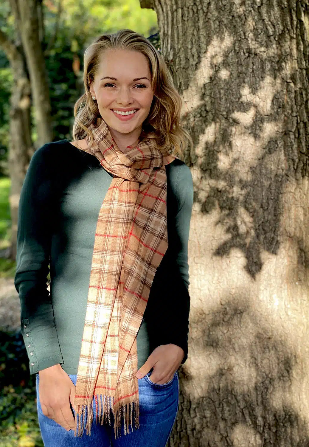Lacorine check alpaca wool scarf featuring a classic plaid pattern, soft texture, and warm, cozy fabric for stylish winter wear.