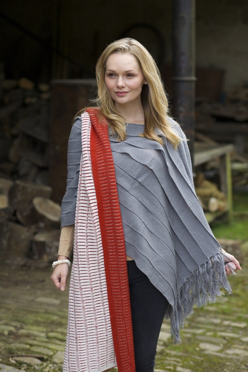 Lacorine Natalia oversized alpaca scarf draped, showcasing soft, warm, and chunky knit in neutral tones for cozy winter wear.