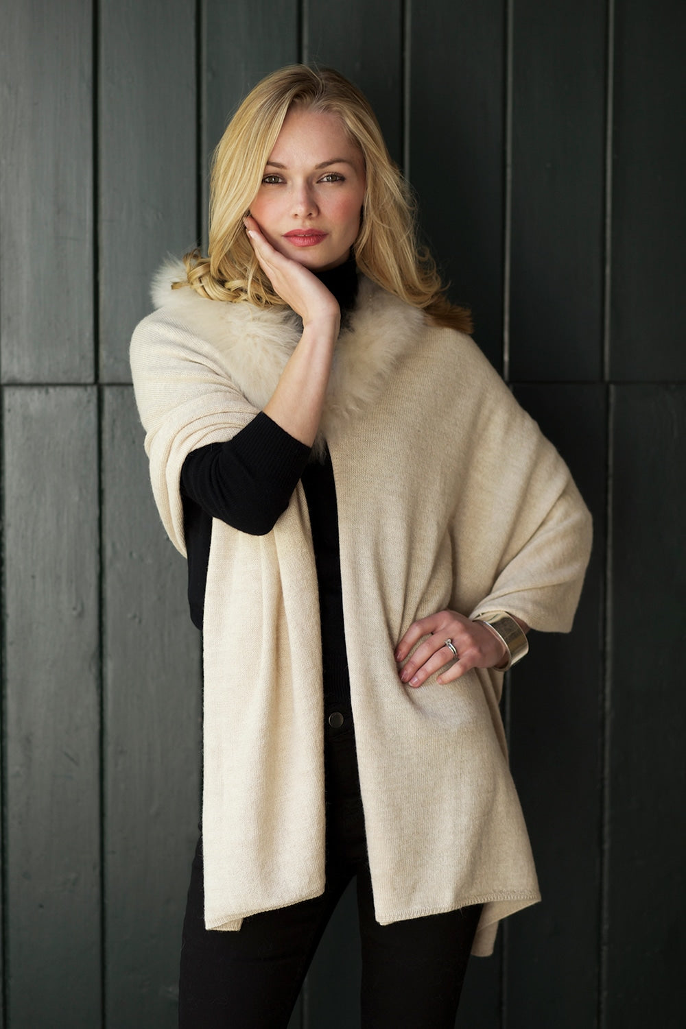 Lacorine Elysée wool shawl in light camel color, draped elegantly to showcase soft, cozy fabric and stylish design.