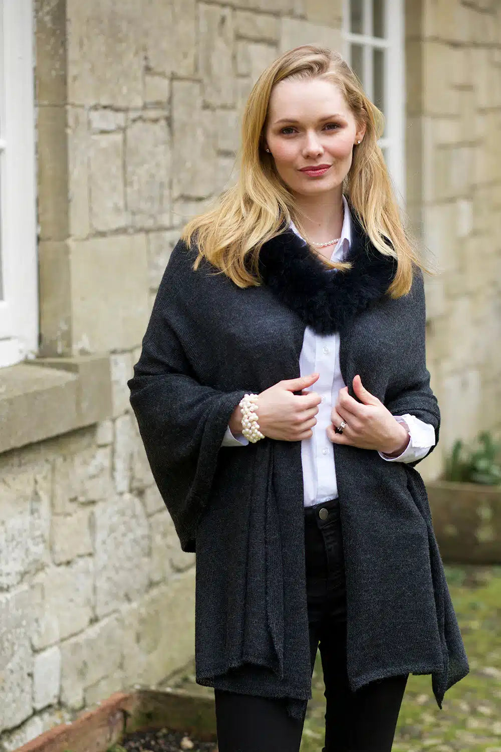 Lacorine Elysée Wool Shawl in charcoal, draped elegantly to showcase soft, warm fabric and stylish design.