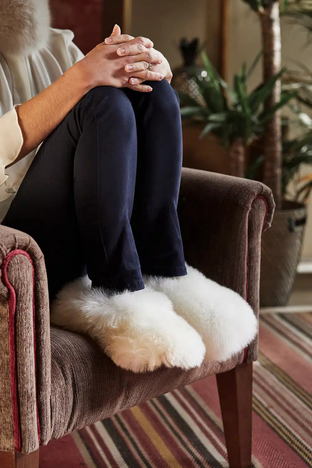 Lacorine alpaca fur slippers in white with plush interior and cozy design, ideal for winter comfort and indoor wear.