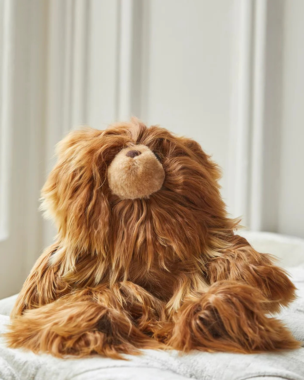 Limited edition Rocco Teddy Bear in dark camel by Lacorine, showcasing soft plush fabric and adorable teddy bear design.